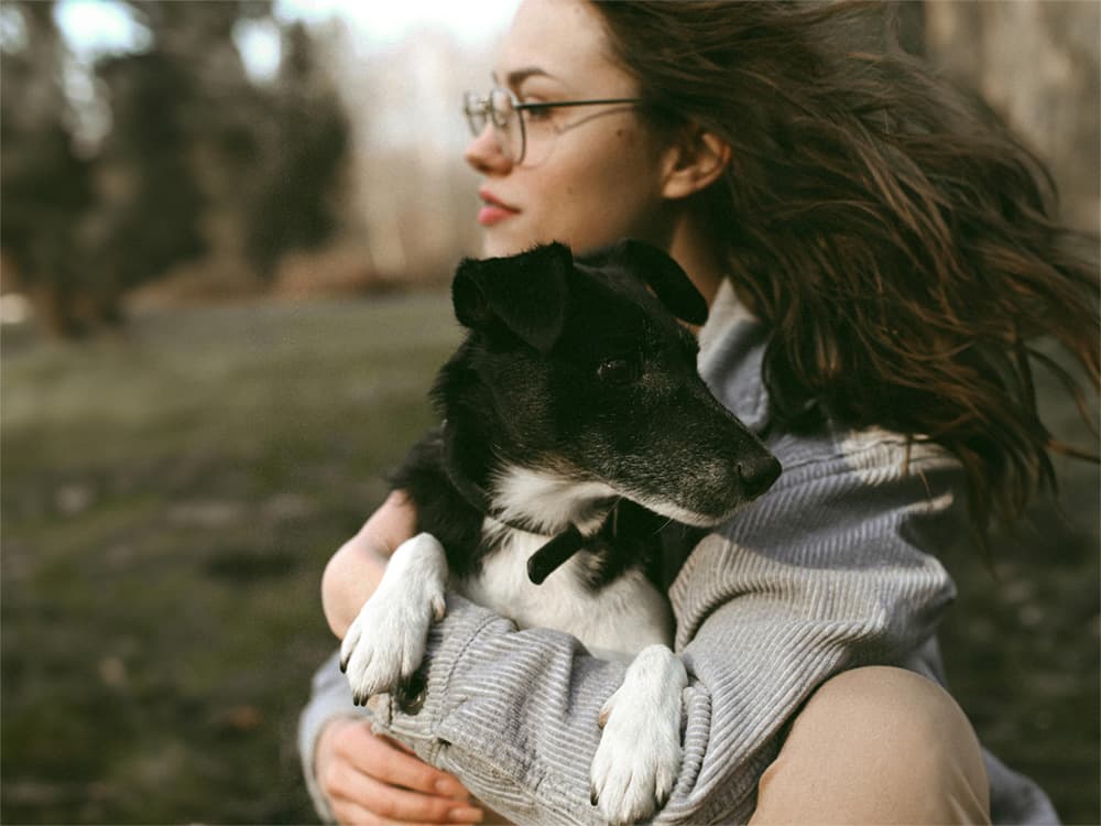 woman with terrier dog